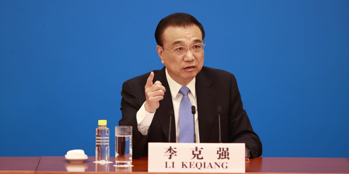 2022年3月11日,时任国务院总理李克强在北京人民大会堂出席记者会并回答中外记者提问。