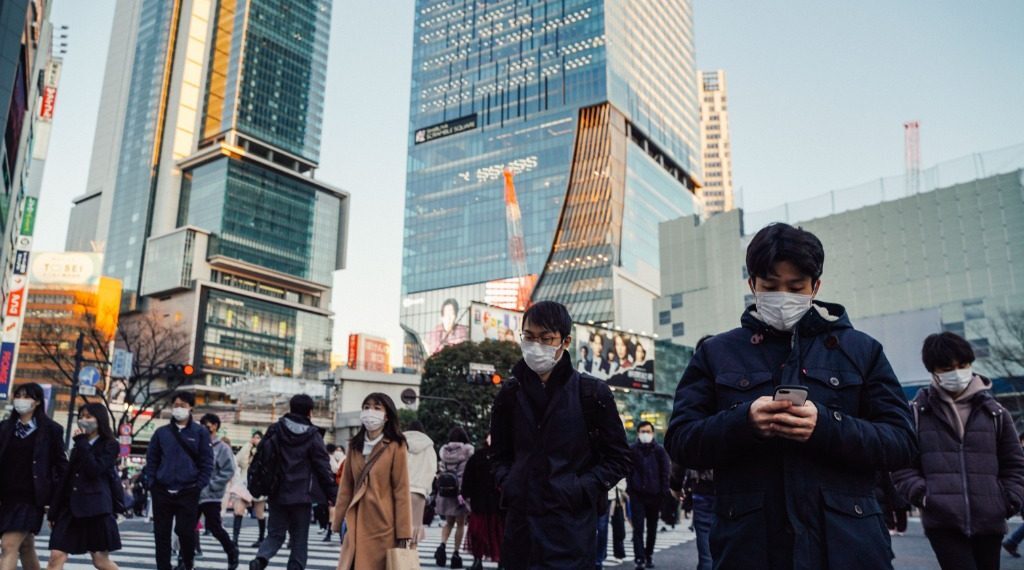 日本新冠累计确诊超500万例 3月起放宽入境限制