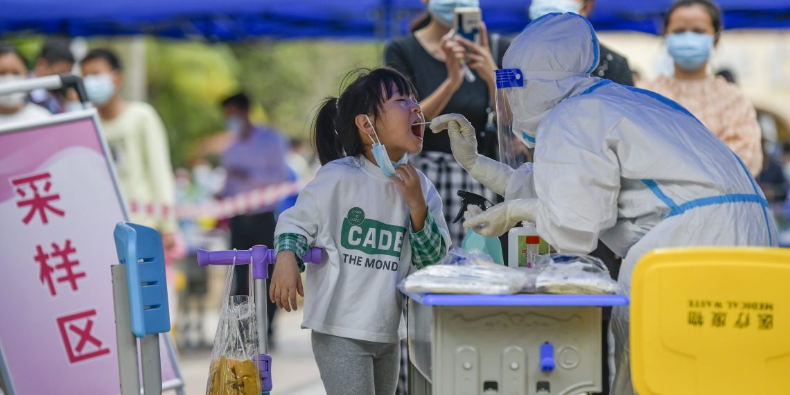 中国内地3日新增确诊病例1405例、无症状感染者11862例