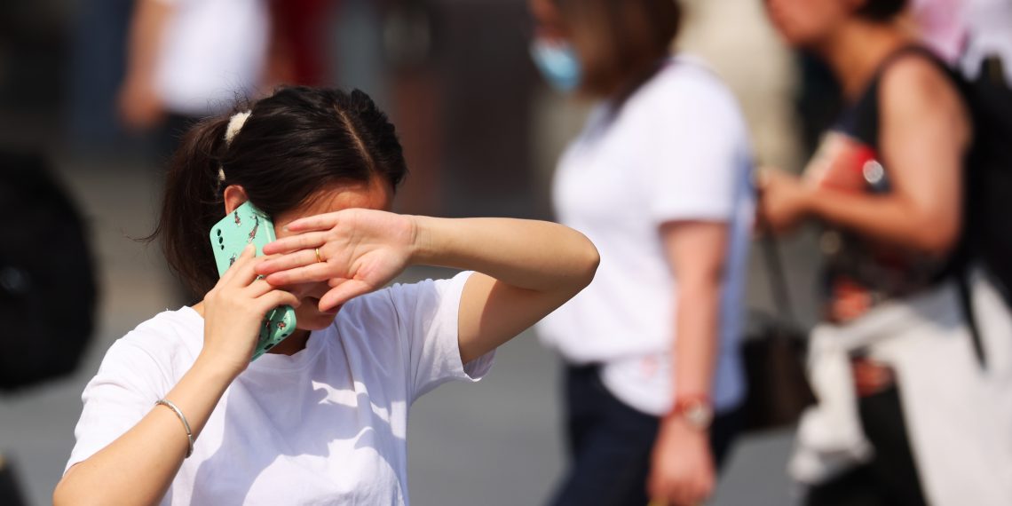 中国连续5天发布高温红色预警 酷暑还将持续多久?