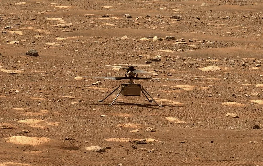 This image captured by the Mastcam-Z imager on NASA's Perseverance Mars rover on April 8, 2021 shows helicopter Ingenuity on Mars