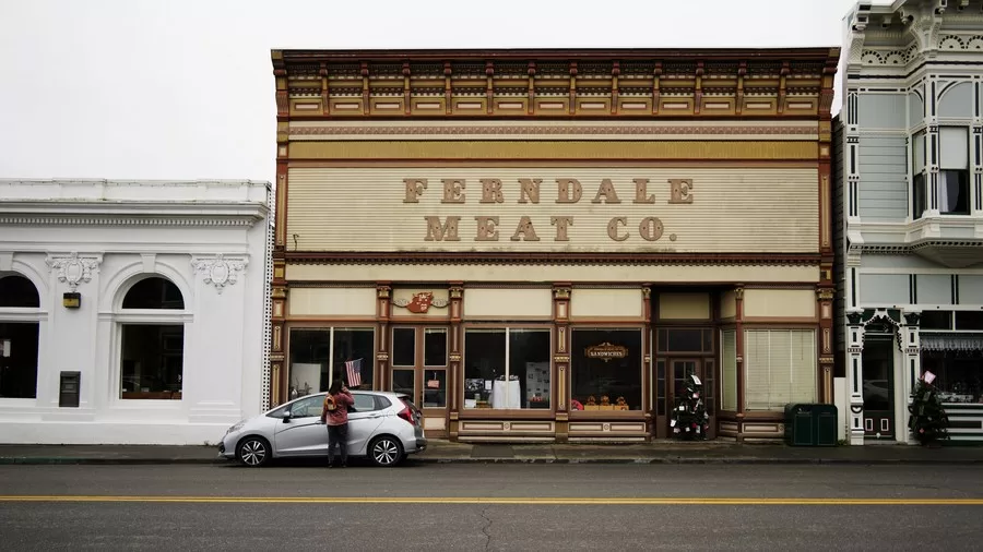 A woman parks her car on a downtown street in Ferndale in Humboldt County, California, the United States, on Dec. 21, 2022.