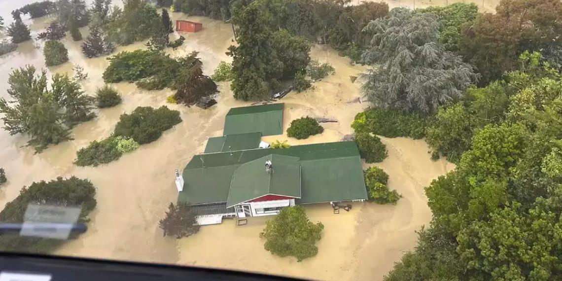 People on a roof amid severe flooding in Hawke's Bay