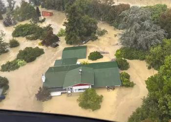 People on a roof amid severe flooding in Hawke's Bay