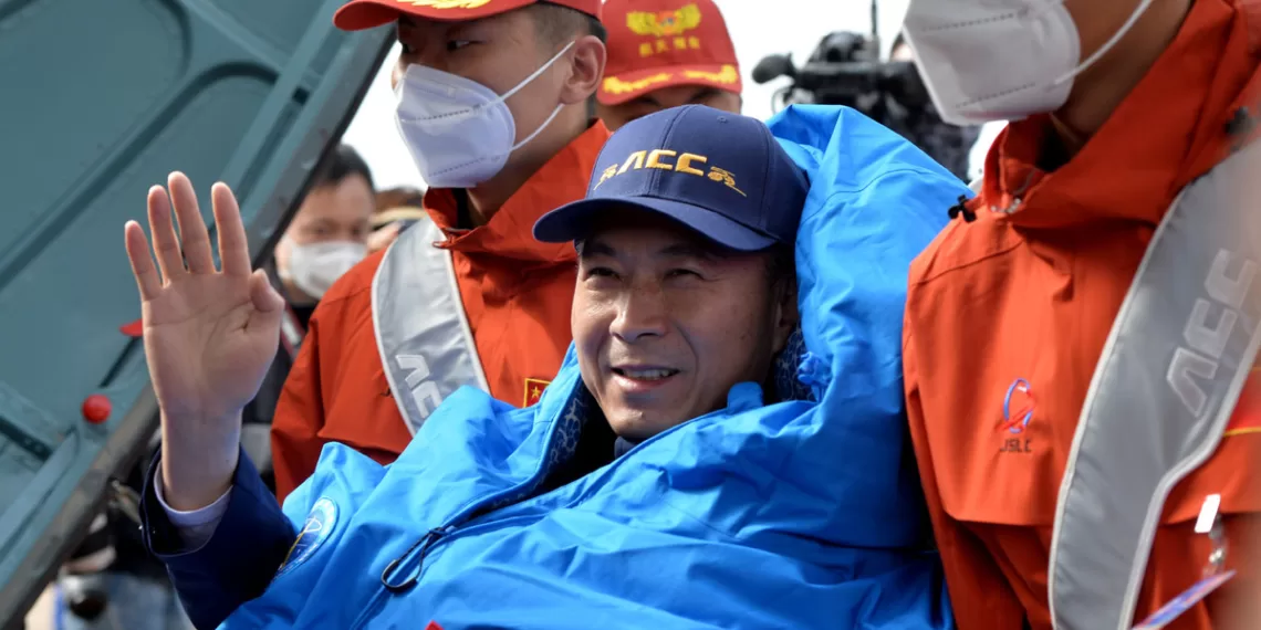 Astronaut Fei Junlong is out of the return capsule of the Shenzhou XV manned spaceship at the Dongfeng landing site in North China's Inner Mongolia autonomous region June 4, 2023.