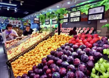 Shoppers buy fruit at a supermarket in Shijiazhuang, Hebei province.