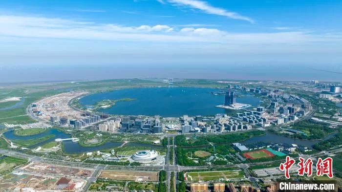 The picture shows an aerial view of the Lingang New Area of Shanghai FTZ.