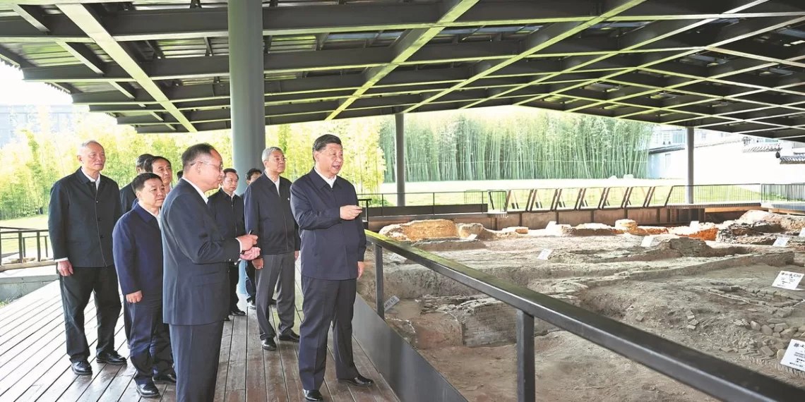 Xi Jinping, general secretary of the Communist Party of China Central Committee, inspects on Wednesday a historical and cultural block in Jingdezhen, Jiangxi province, where he learned about the preservation and inheritance of ceramic culture. XIE HUANCHI/XINHUA