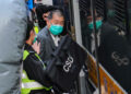 香港前传媒大亨黎智英串謀勾結外國勢力等罪被判囚20年
